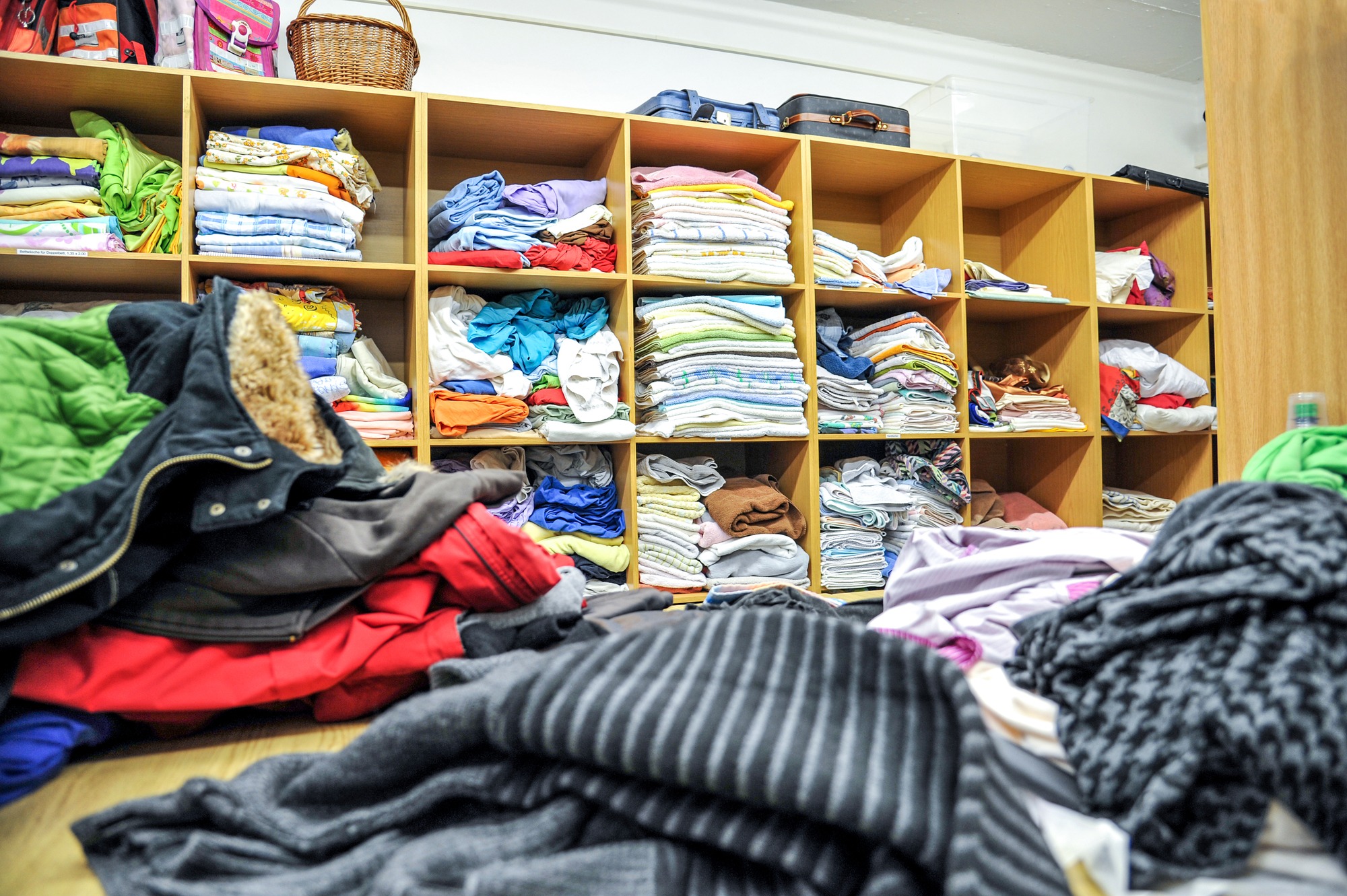 Large selection of different used textiles, towels, linen, Jackets, bedclothes, and accessories